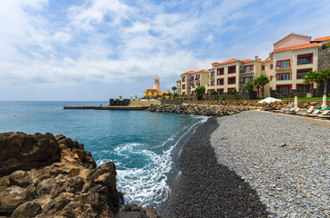 Fototapeta na wymiar Beautiful beach in small village on coast of Madeira island