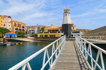Fototapeta na wymiar Lighthouse in beautiful port, Madeira island, Portugal