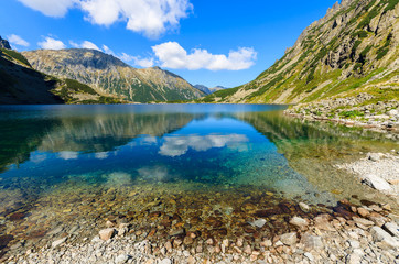 Fototapeta na wymiar Beautiful Czarny Staw lake in summer, Tatra Mountains, Poland