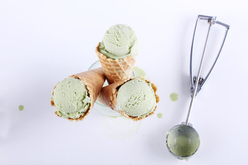 green tea ice cream cones in clear glasses