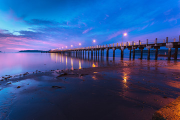 Fototapeta premium beautiful sunrise at the sea pier