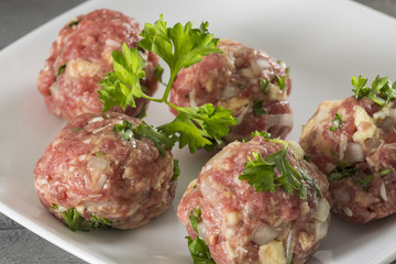 Raw meatballs.