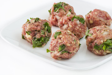 Raw meatballs.