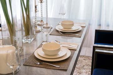 Ceramic tableware on the marble worktop