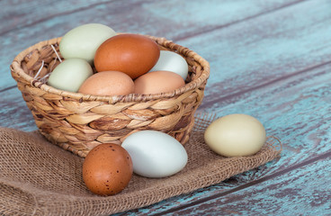 Fresh chicken eggs in a basket - 80289409