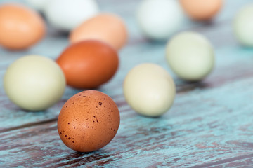 Assortment of different color fresh chicken eggs