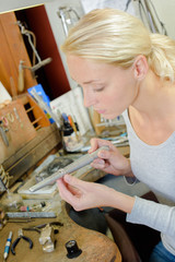 Jeweller in her workshop