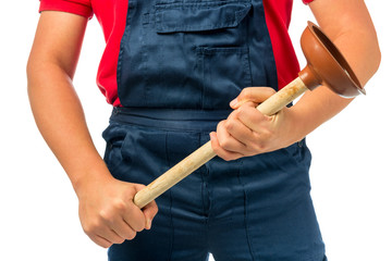 plunger for pipe in the hands of a plumber