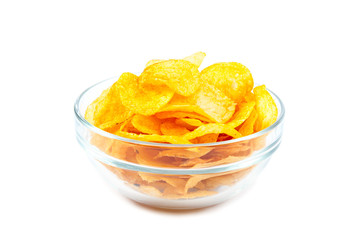Potato chips in glass bow on white background.