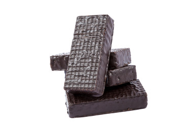 Chocolate candies on white background.