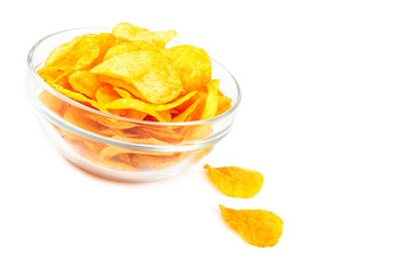 Potato chips in glass bow on white background.