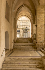 Fototapeta na wymiar Stone arches and gallery in old Jaffa