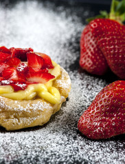 Zeppole with strawberry- tipical italian pastry