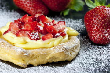 Zeppole with strawberry- tipical italian pastry