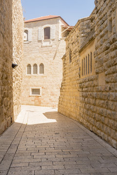 narrow streets of old Jerusalem. Stone houses and arches