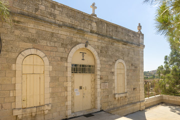 Fototapeta premium narrow streets of old Jerusalem. Stone houses and arches