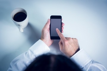 Businessman using his smart phone