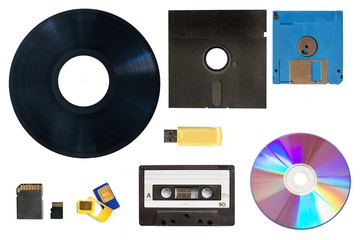 Vintage vinyl record, floppy disk, memory card, cassette tape, CD, evolution and history of...