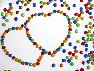 multi color of coated chocolate  in heart shape