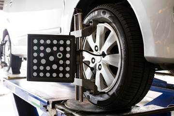 Wheel balancing of a vehicle in progress