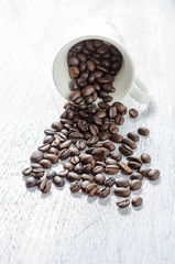 Coffee beans in coffee cup