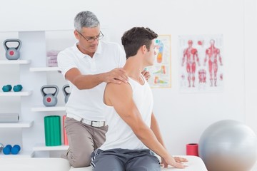 Doctor doing back adjustment