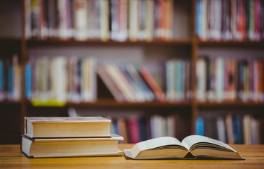 Books on desk in library