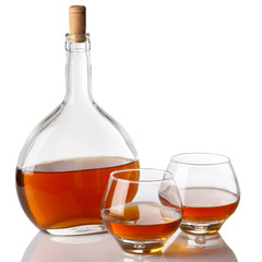 Bottle and glasses with cognac