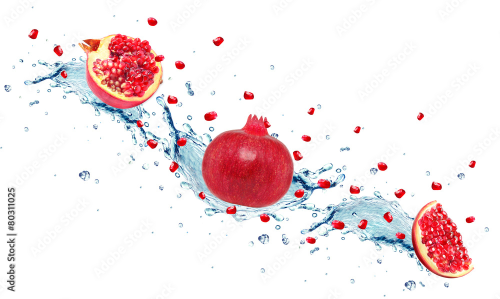 Wall mural pomegranate and water splash isolated on white