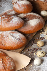 Variety of rye bread on a wooden background