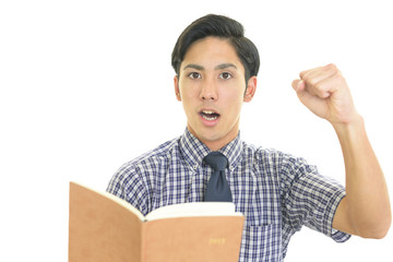 ガッツポーズのビジネスマン