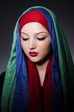 Portrait of the young woman with headscarf