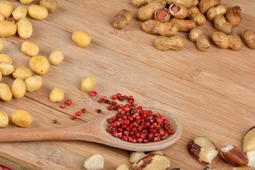 nuts, cloves, star anise and pink peppercorn