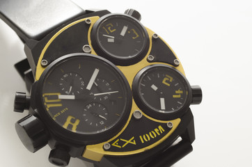 Gold and black watch isolated