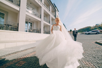 Obraz premium blonde bride with her groom