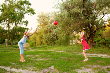  Kids playing in a suburban neighborhood.
