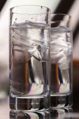 Water glasses with ice