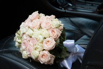 bridal bouquet in the car