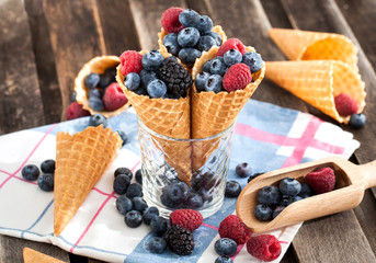 Fresh berries in waffle cone