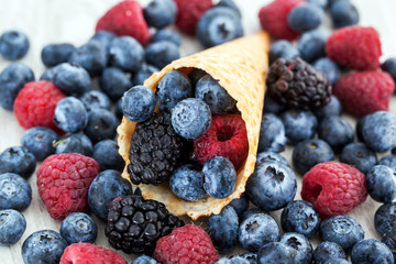 Fresh berries in waffle cone