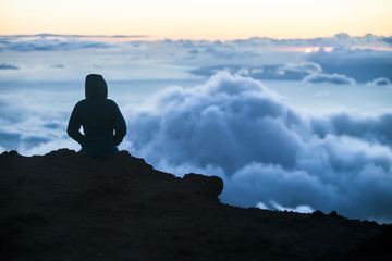 Watching Sunset Above Maui Clouds