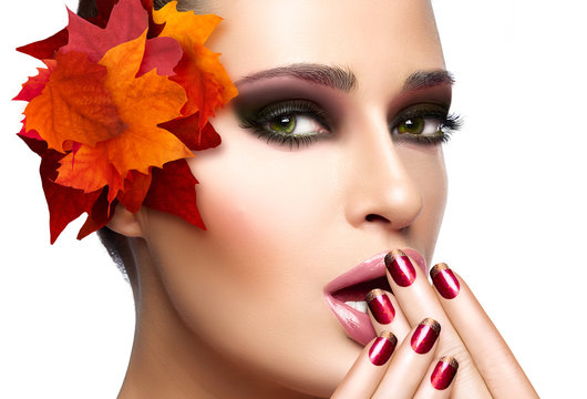 Trendy Autumnal Makeup and Nail Art. Beauty Fashion Concept