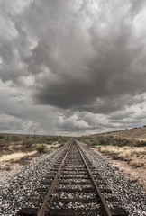 Single Railroad Track in Desert