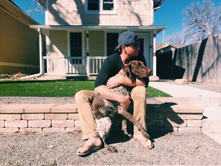 american male with dog