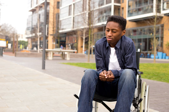 a young wheelchair user looking worried.