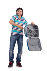 Young man with suitcase isolated on white