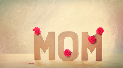 3D MOM Text with Carnation Flowers on the Table