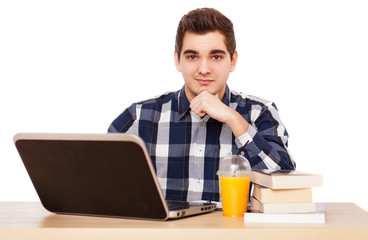 Young man working with a laptop