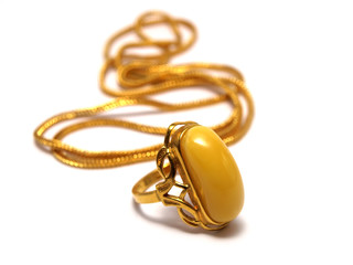 Isolated yellow amber gilded ring chain