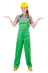 Female handyman in overalls isolated on white